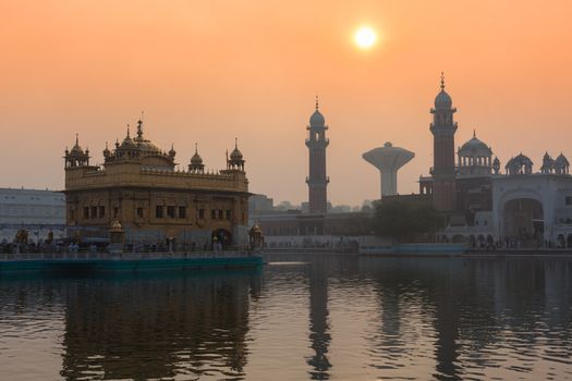 Sikh gurdwara Golden Temple (Harmandir Sahib) on sunrise. Amritsar, Punjab, India