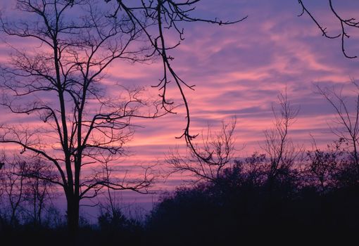 sunset in late winter with clouds