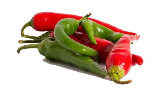 red and green hot chili peppers isolated on a white background