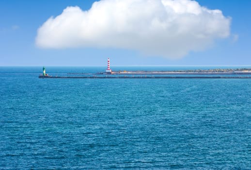 Lighthouse at the entrance to the port