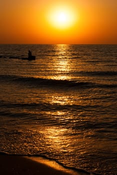 Beautiful seascape with orange warm sunrise, vacation concept