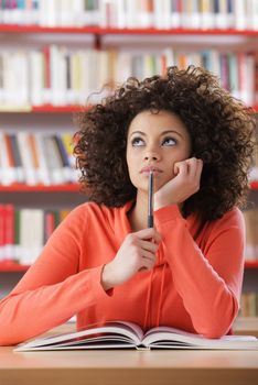 Portrait of female student in library