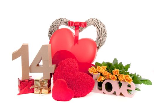 Number of age in a colorful studio setting with heart and gifts and yellow roses