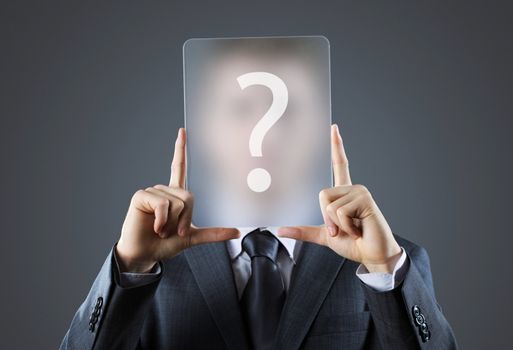 Young business man holding question mark signs in front of his faces