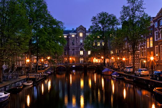 Beautiful night view of the channel in Amsterdam