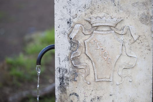 Typical public water fountain in Rome