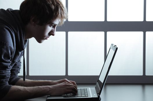 Young man working on laptop