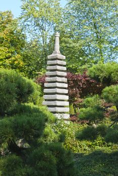 Green Japanese garden, blue sky, sunny day