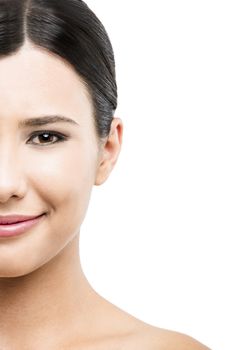 Beauty portrait of young asian woman smiling, isolated over white background.