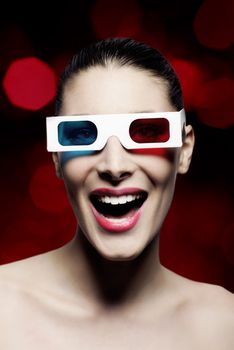 Smiling  woman watching a funny 3d movie 