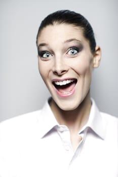 Portrait of beautiful woman happy and surprised