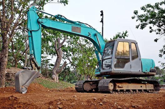 Excavators are heavy construction equipment consisting of a boom, bucket and cab on a rotating platform.
