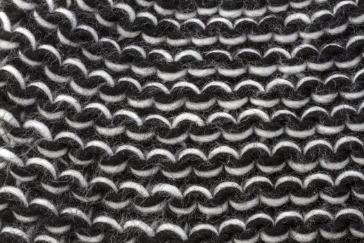 Texture of black sweater background