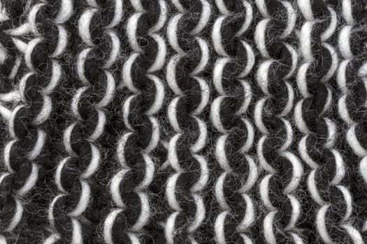 Texture of black sweater background