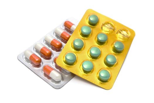 Colorful pills closeup on white background 
