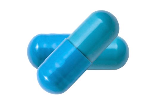 Blue capsules isolated on white background 
