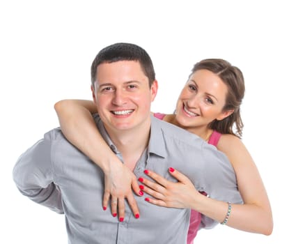 Portrait of a beautiful young happy smiling couple. Isolated white backround