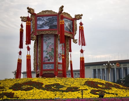 Large Chinese Lantern Decoration Tiananmen Square, Beijing, China.  Decoration is for October 1st Holiday.  Back of the Lantern Decoration is the Great Hall of the People.