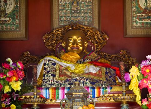 Laughing Buddha Altar Offerings Yonghe Gong Buddhist Lama Temple Beijing China Built in 1694, Yonghe Gong is the largest Buddhist Temple in Beijing.