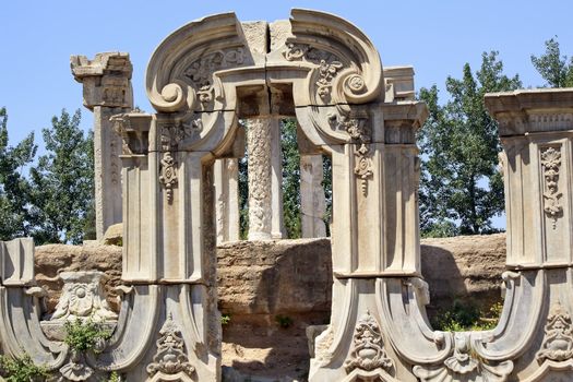 Ancient Gate Ruins Pillars Old Summer Palace Yuanming Yuan Beijing China  Old Summer Palace was destroyed by British and French Army in 1860 Second Opium War Dashuifa built in 1759 by Emperor Qianlong