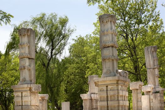 Ancient Ruins Pillars Old Summer Palace Yuanming Yuan Beijing China  Old Summer Palace was destroyed by British and French Army in 1860 Second Opium War Dashuifa built in 1759 by Emperor Qianlong