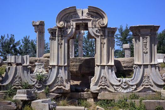 Ancient Gate Ruins Pillars Old Summer Palace Yuanming Yuan Beijing China  Old Summer Palace was destroyed by British and French Army in 1860 Second Opium War Dashuifa built in 1759 by Emperor Qianlong