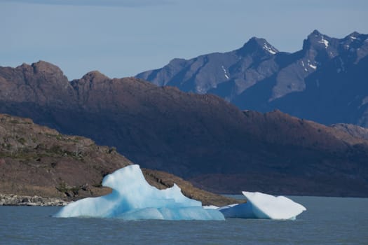 Spectacular blue iceberg floating on the Lake Argentino in the Los Glaciares National Park, Patagonia, Argentina.