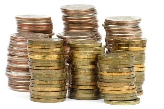 Stacks of Gold and Silver Coins isolated on white background