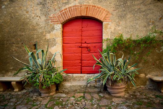 Red door at the ancient Tuscany Castle