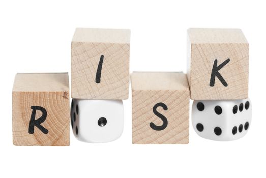 Risk spelt with wooden blocks. White background.