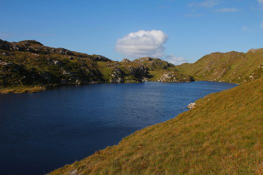 Salt lake and surrounding rocks on Irish peninsula
