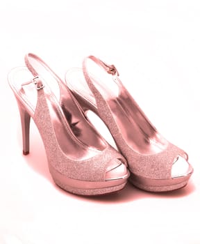 Pink glitter stiletto heels on white background