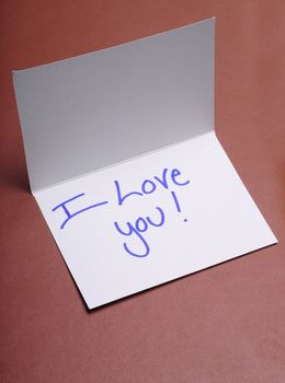 A handwritten note saying I love you