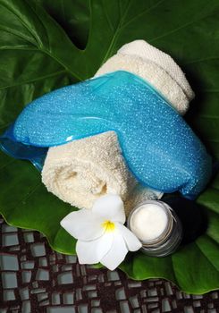Spa experience with eye mask and eye cream in natural setting
