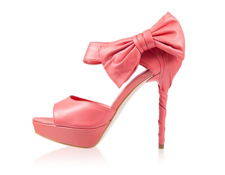 Evening shoes with a bow on a high heel. Isolated on white with clipping path