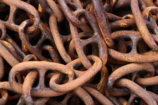 in a harbor in denmark  a rusted  chain 