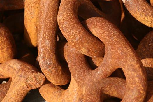 in a harbor in denmark  a rusted  chain 