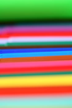 not created abstractions, curves, lines, patterns, here close up picture of children pencils with narrow dof

