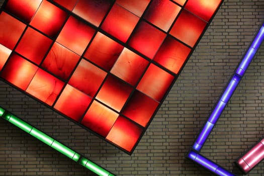 electrical neon  light indoor in a building wall