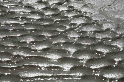 a sunny summer day, sand pattern on a beach


