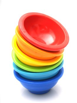 Stack of rainbow mixing bowls used in the kitchen