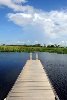 Scenic view of dock on lake or swamp