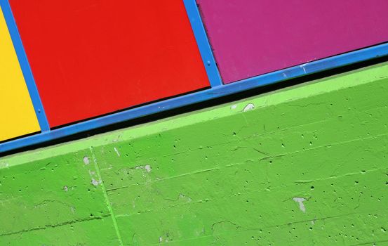 wall of a house of various strong colours