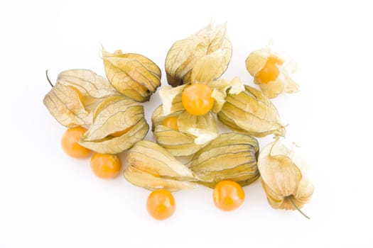 Fresh small physalis fruits isolated on white background, jam-berry