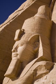 The head of a stone statue from the temple of Ramses at Abu-Simbel in Egypt