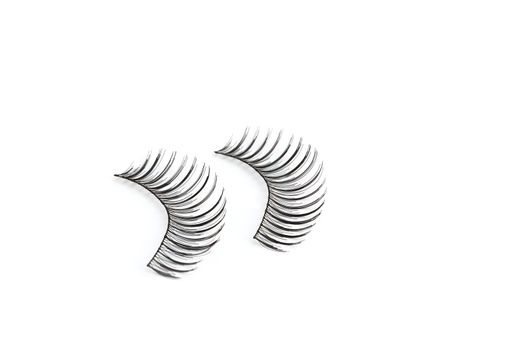 False eyelashes isolated on white background