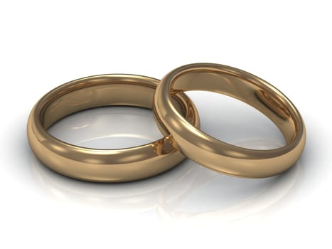 Wedding rings: one ring lies on the other on a white background