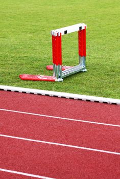 Track and hurdles on the green lawn