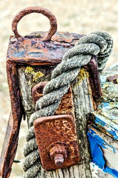 Old rope wrapped around the bow of a disused boat
