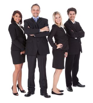 Diverse group of business people confidently standing  together on white background